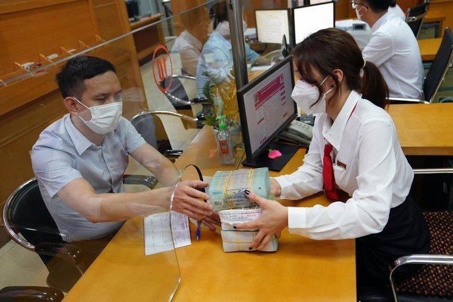 Tin ngân hàng tuần qua: Ngân hàng Nhà nước dừng thi hành quy định kiểm soát cho vay vốn Tin ngân hàng tuần qua: Ngân hàng Nhà nước dừng thi hành quy định kiểm soát cho vay vốn