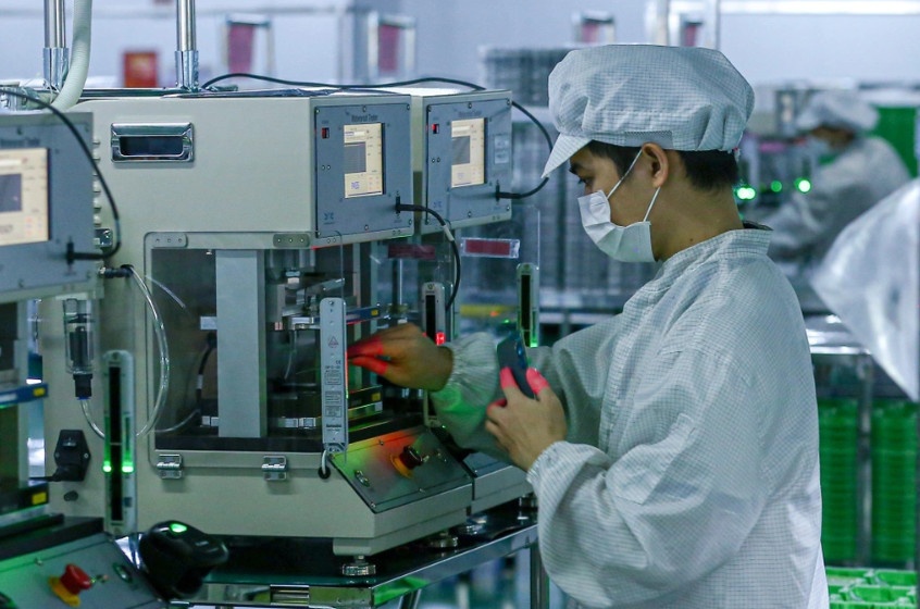 Quy định tiền lương đóng BHXH bắt buộc (Ảnh minh họa: Hoa Lê),